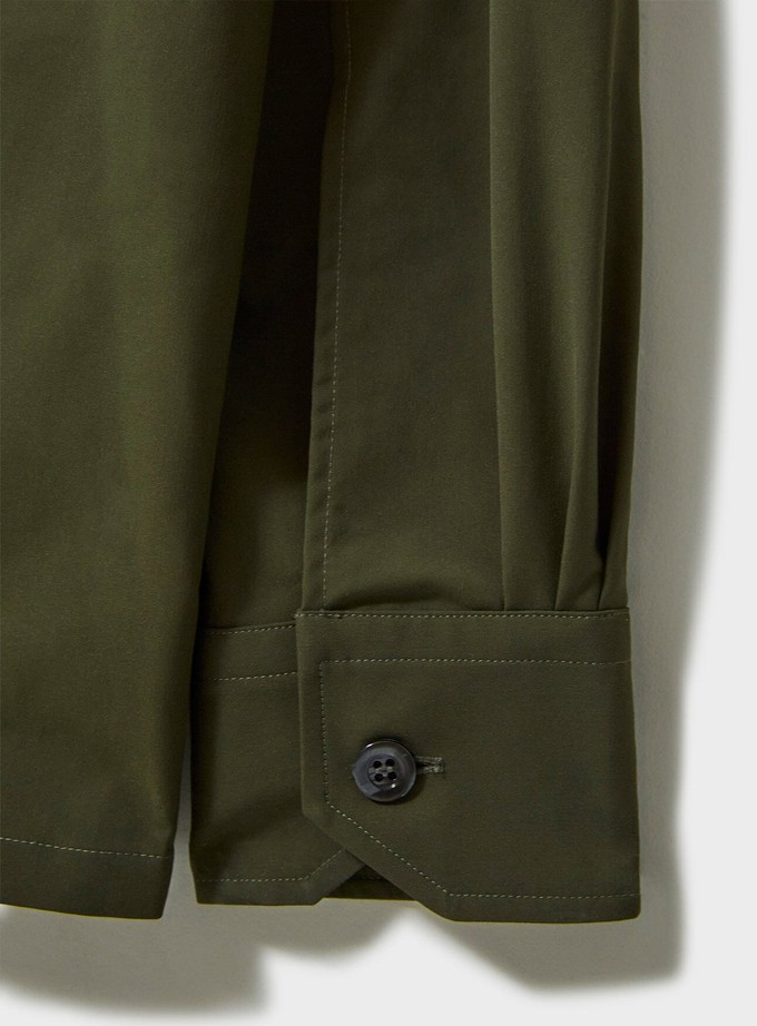 Set 3: Neem Green 4-Pocket Rain Jacket + Navy Flannel Overshirt + Navy Soft Pleated Trousers from Neem London